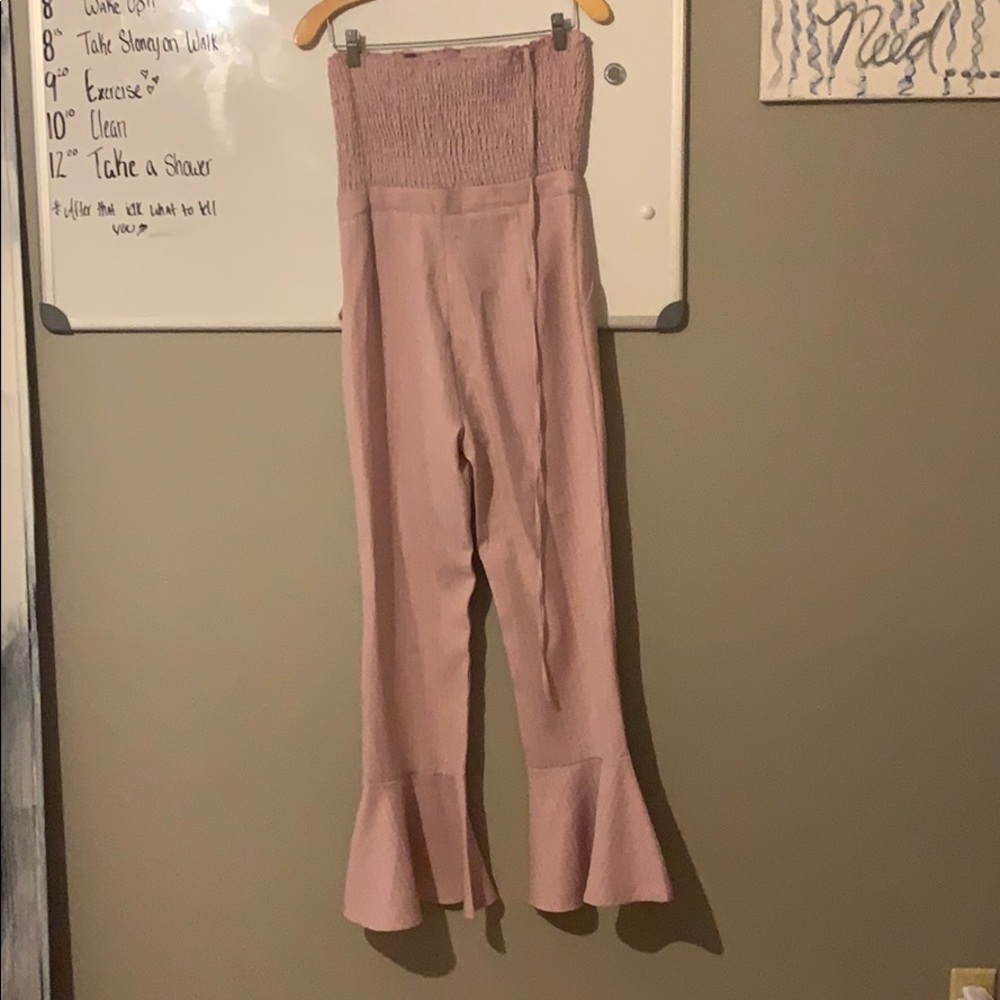 Light Pink strapless jumper.